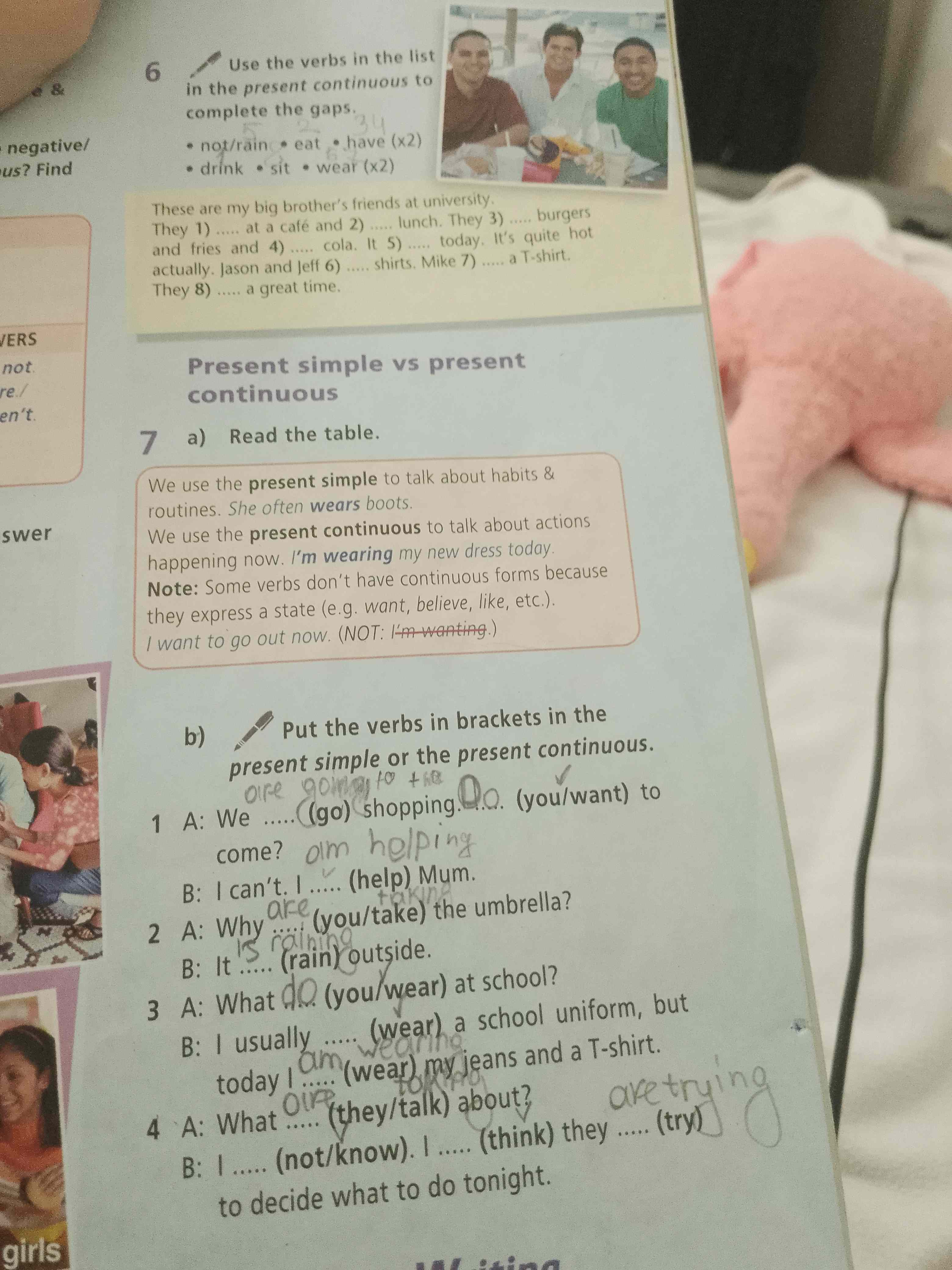 Фото задания: 7 b) Put the verbs in brackets in the present simple or the present continuous. 1 A: We .....(go) shopping. Do (you/want)…