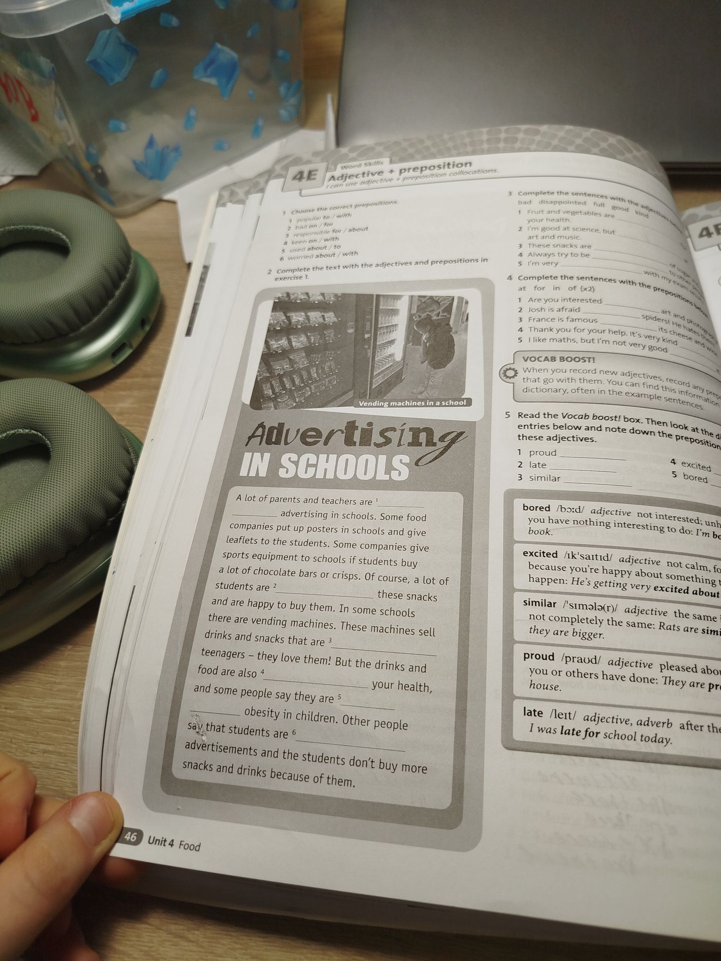 Фото задания: 2 Complete the text with the adjectives and prepositions in exercise 1. A lot of parents and teachers are ¹ advertising in…