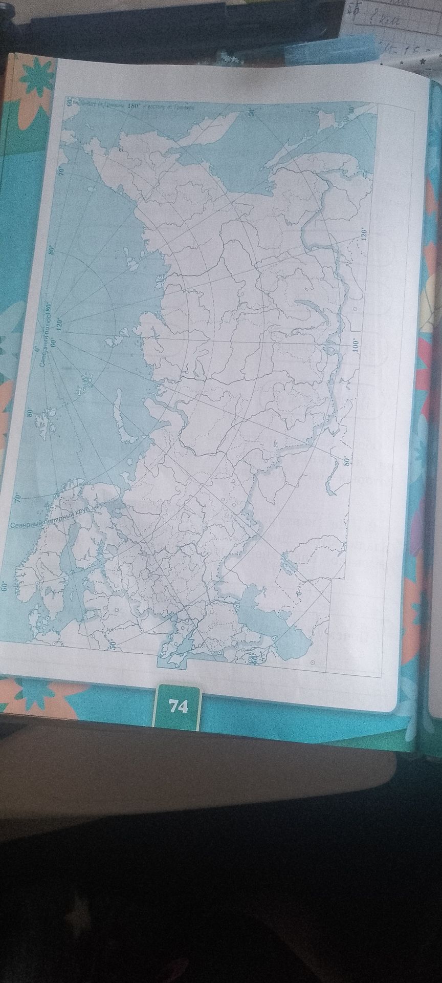 Фото задания: The map shows latitude and longitude lines, indicating geographical coordinates. The number '74' is likely a page or exercise…