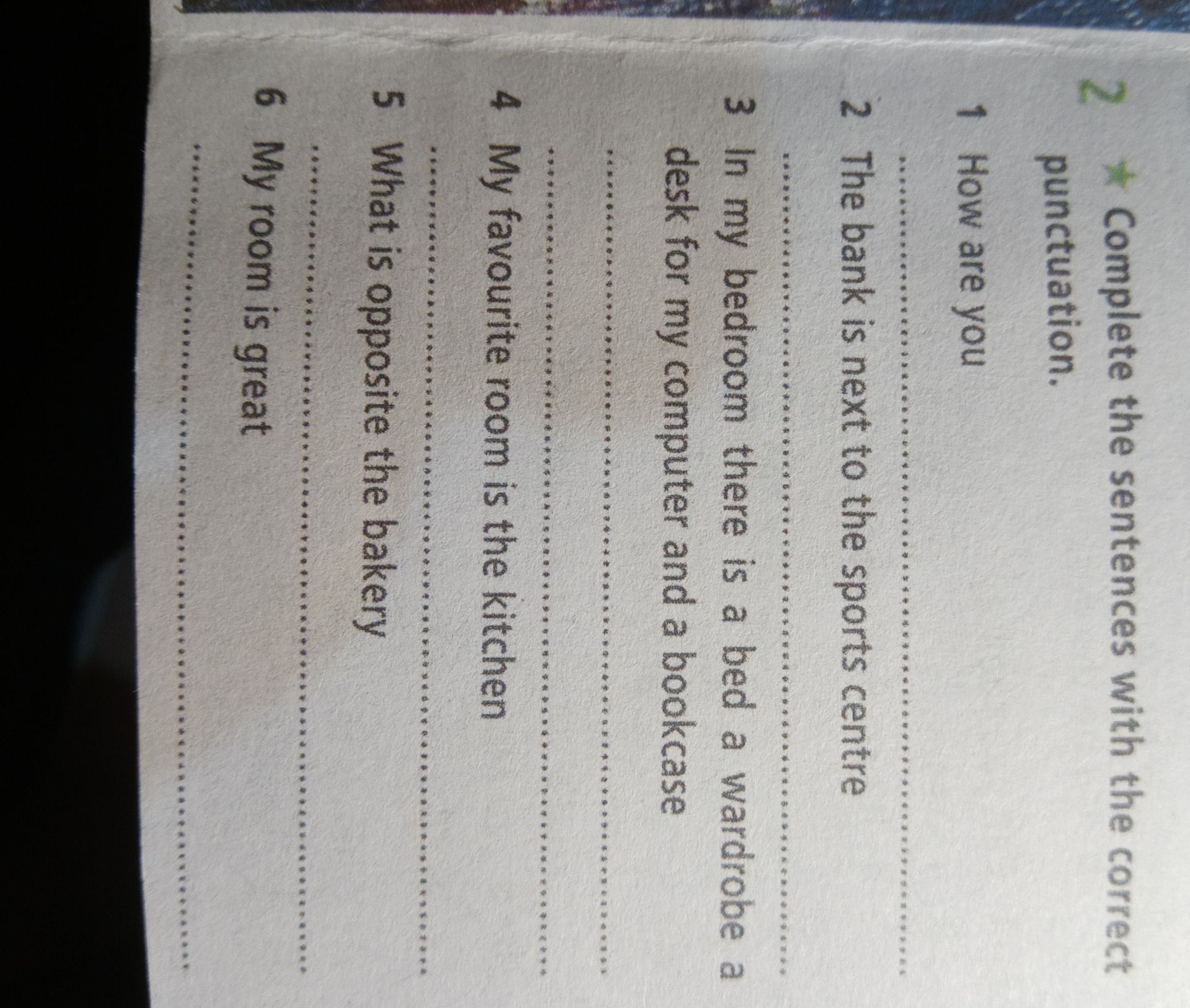 Фото задания: 2 ★ Complete the sentences with the correct punctuation. 1 How are you 2 The bank is next to the sports centre 3 In my…