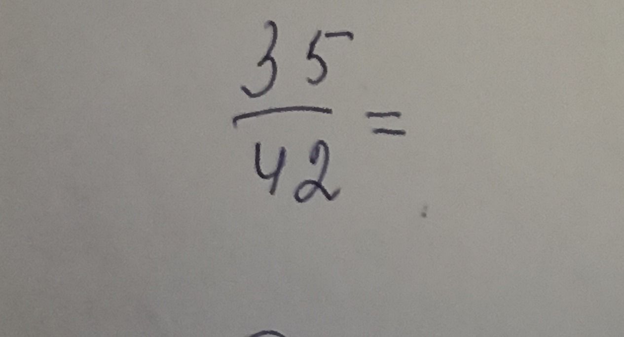 Фото задания: Simplify the fraction: \(\frac{35}{42}\).