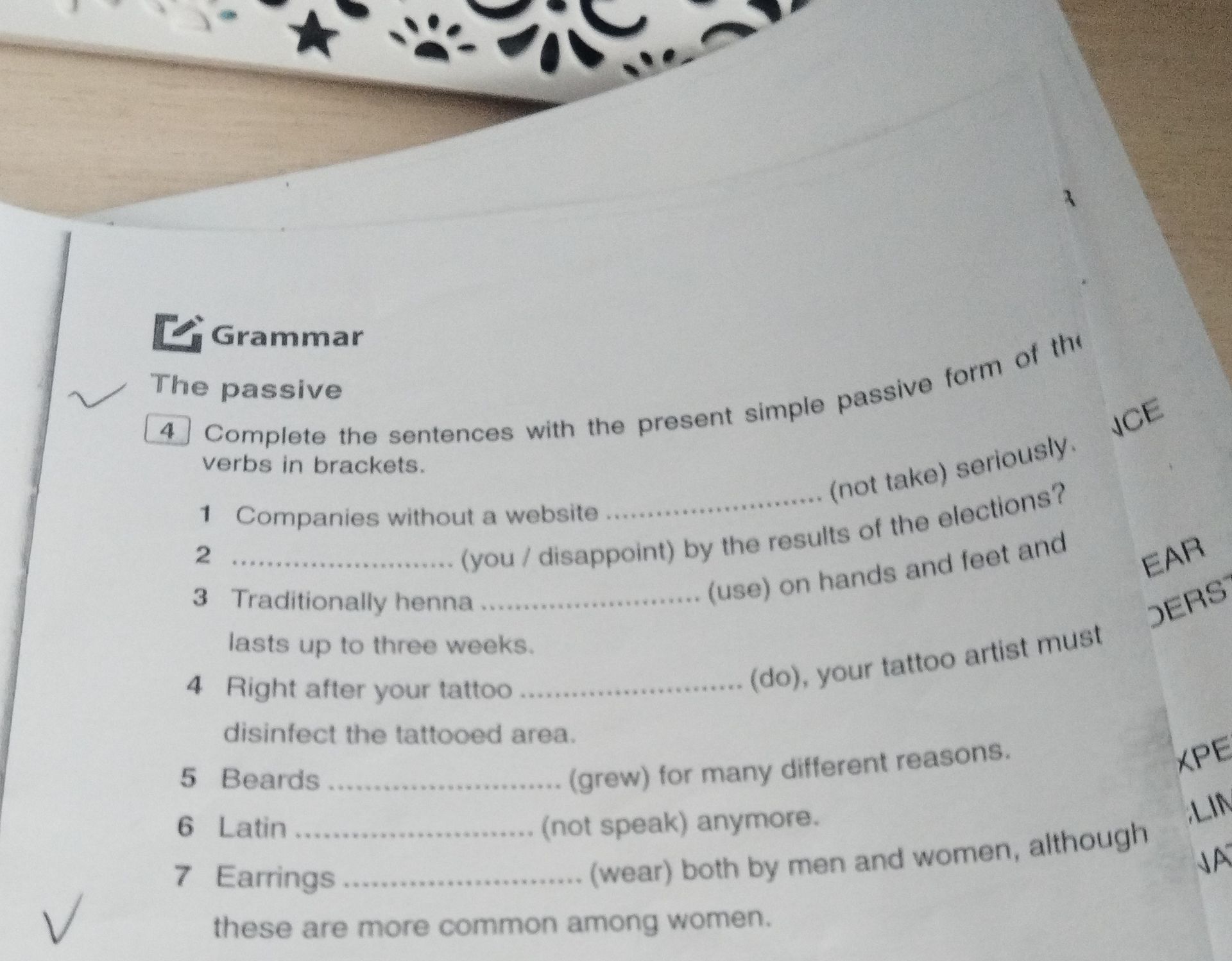 Фото задания: Complete the sentences with the present simple passive form of the verbs in brackets.