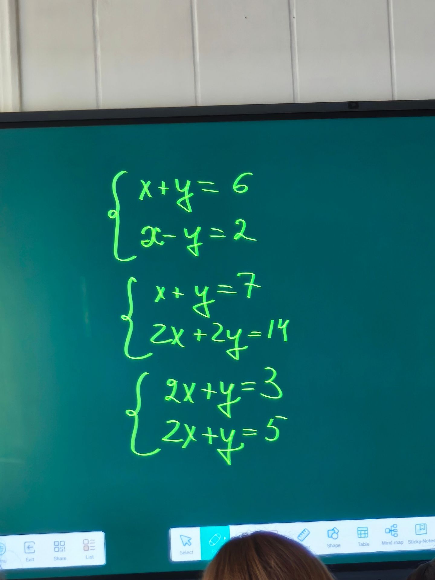 Фото задания: Solve the system of equations: \(\begin{cases} 2x + y = 3 \\ 2x + y = 5 \end{cases}\)
