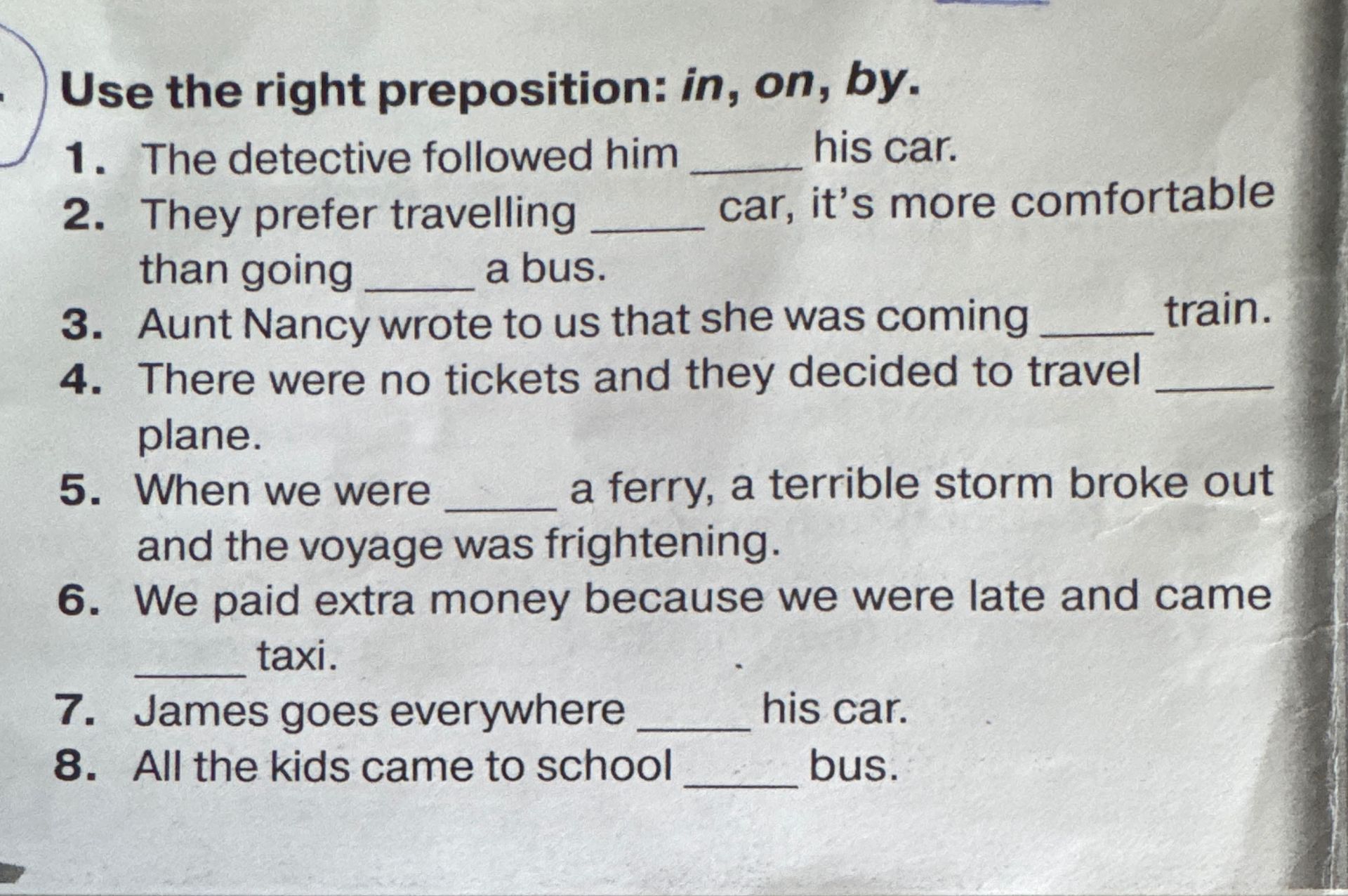 Фото задания: Use the right preposition: in, on, by.