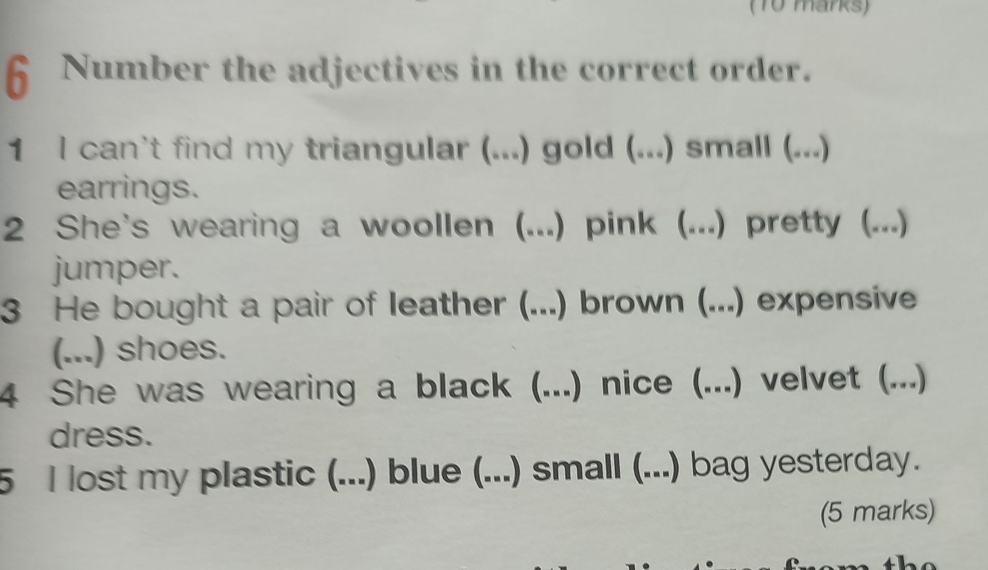Фото задания: 2 She's wearing a woollen (...) pink (...) pretty (...) jumper.