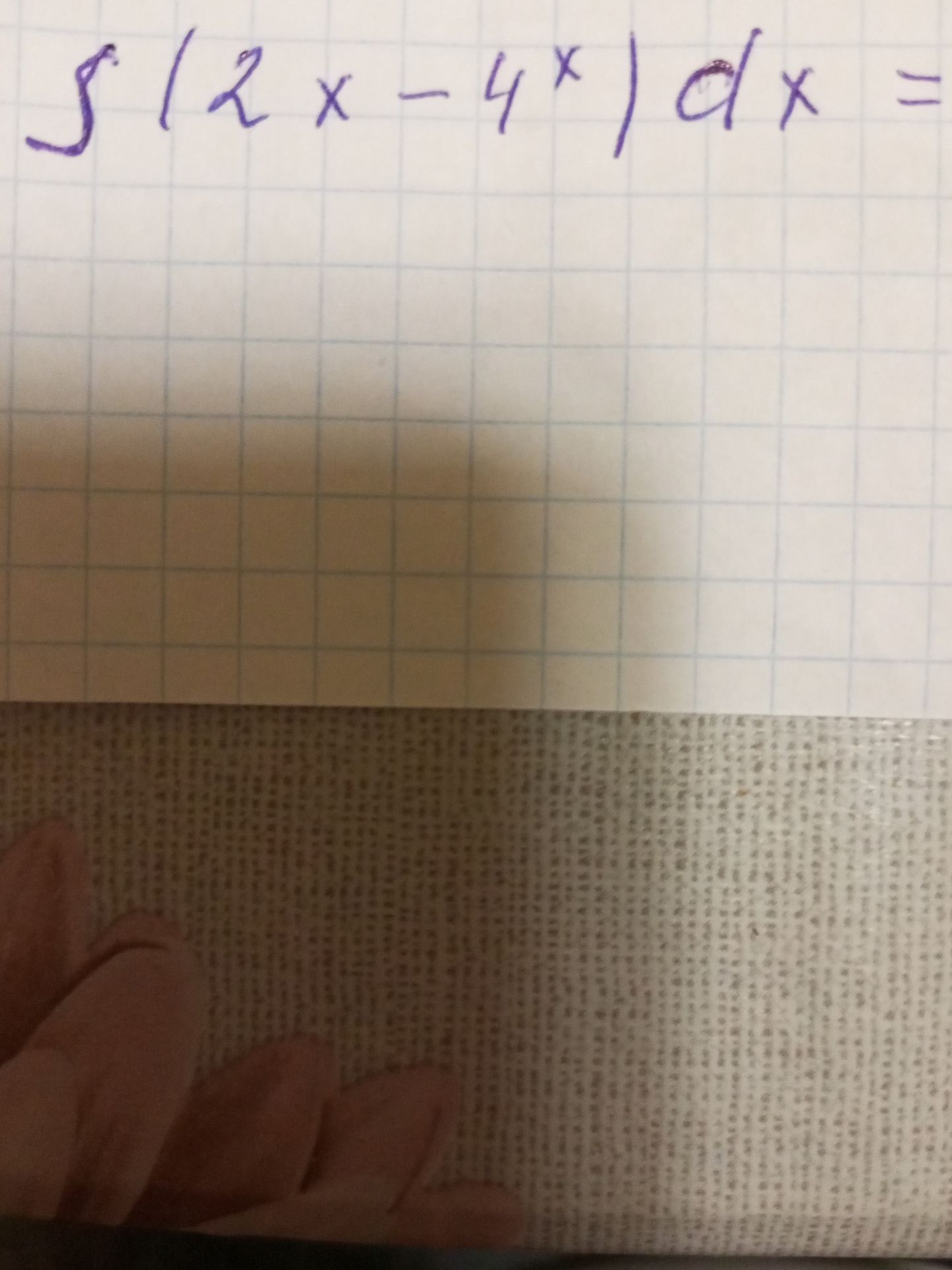 Фото задания: Solve the integral: \( \int (2x - 4^x) dx \)