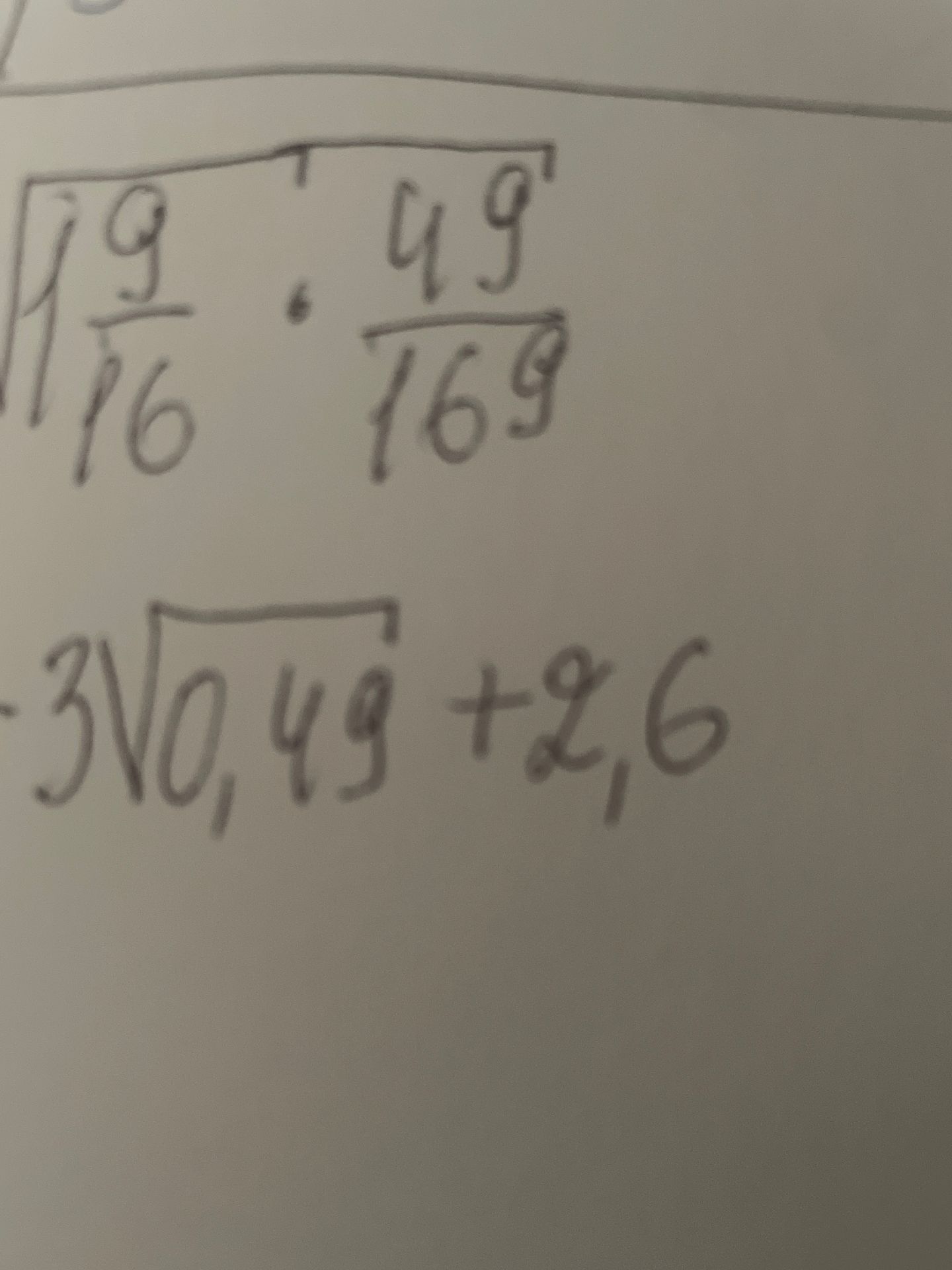 Фото задания: Simplify the expression: \(\sqrt{\frac{9}{16}} : \frac{49}{169}\) and \(-3\sqrt{0.49} + 2.6\)