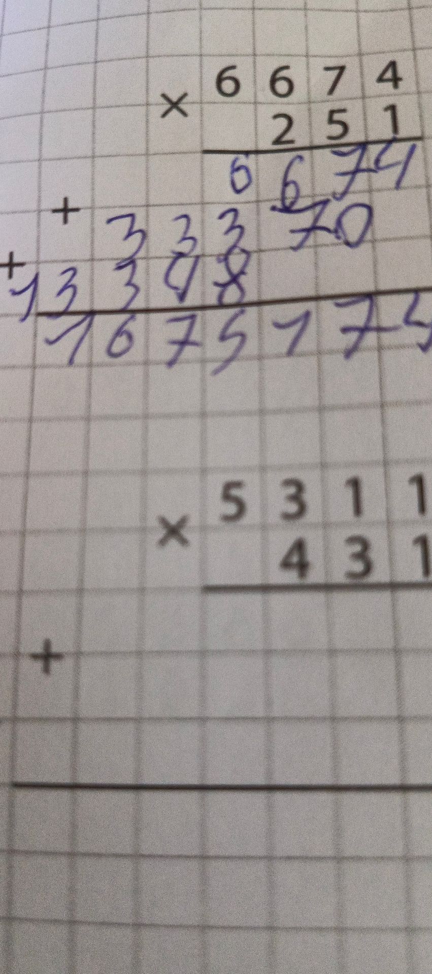 Фото задания: Solve the multiplication problem shown in the image.