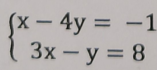 Фото задания: Solve the system of equations: \(\begin{cases} x - 4y = -1 \\ 3x - y = 8 \end{cases}\)