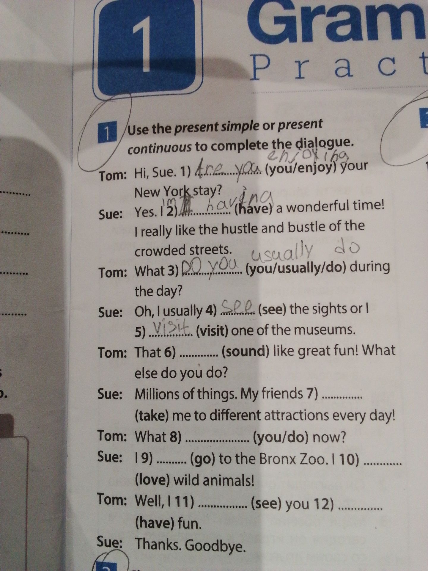 Фото задания: Use the present simple or present continuous to complete the dialogue.
