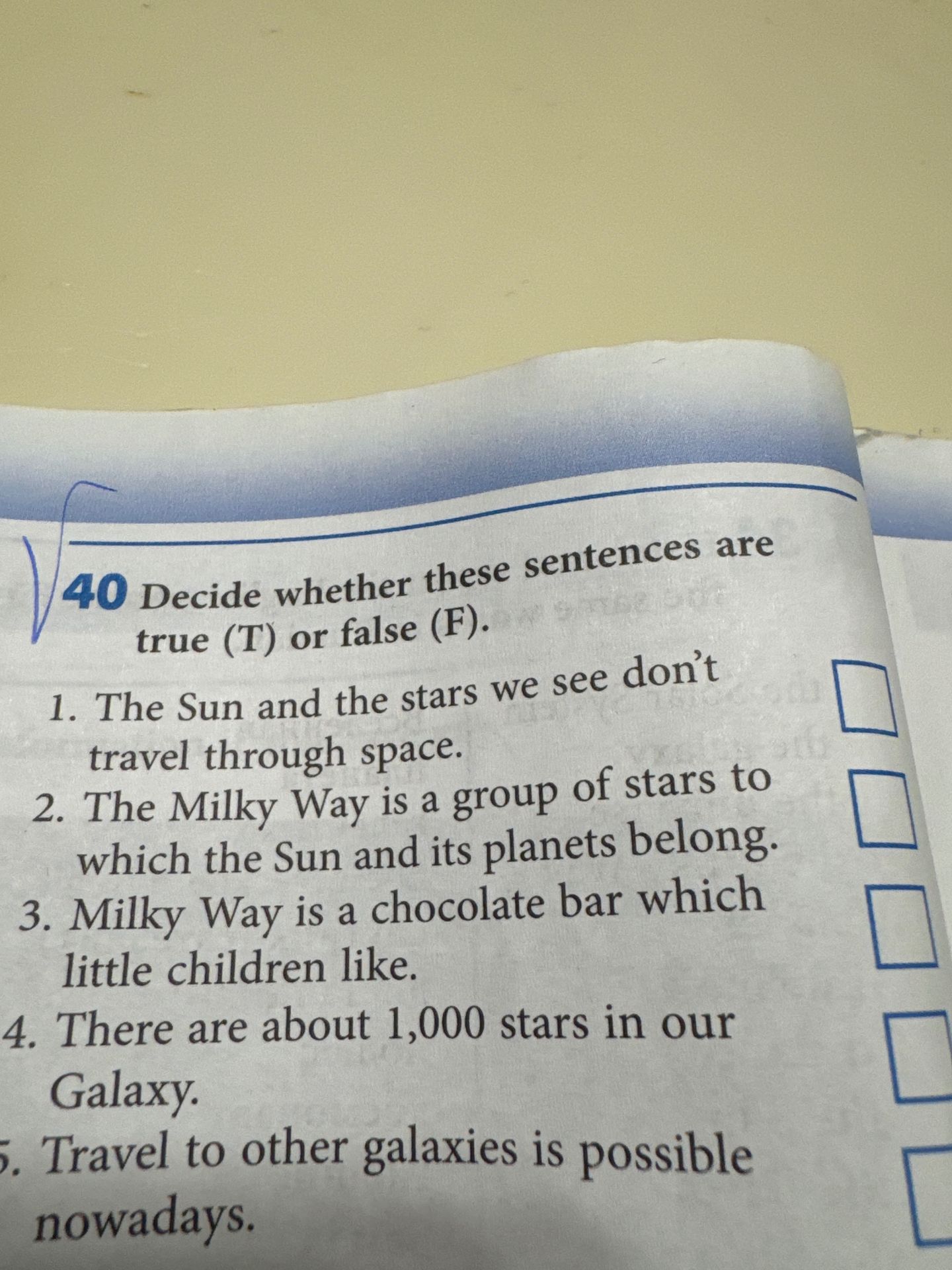 Фото задания: 40. Decide whether these sentences are true (T) or false (F). 1. The Sun and the stars we see don't travel through space.…