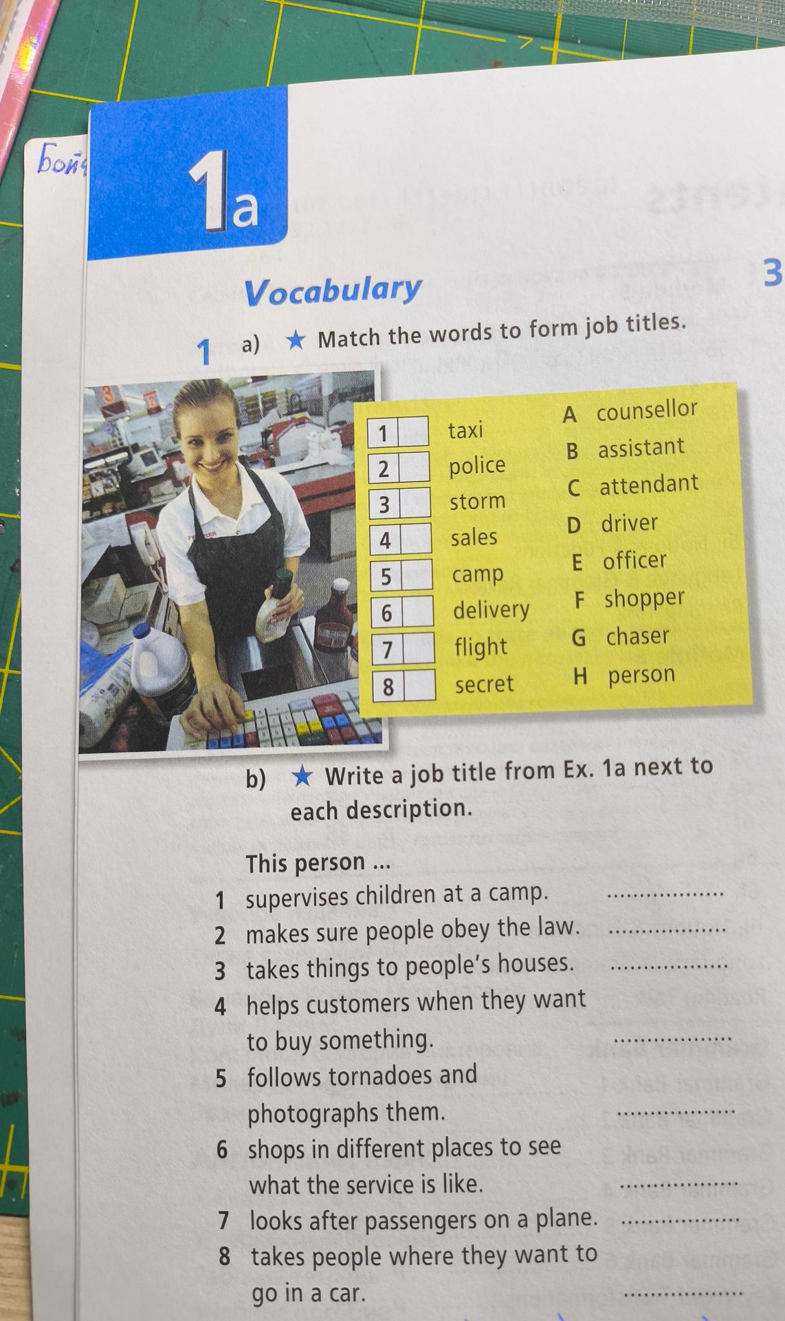 Фото задания: 1b) Write a job title from Ex. 1a next to each description. This person … 1 supervises children at a camp. 2 makes sure…
