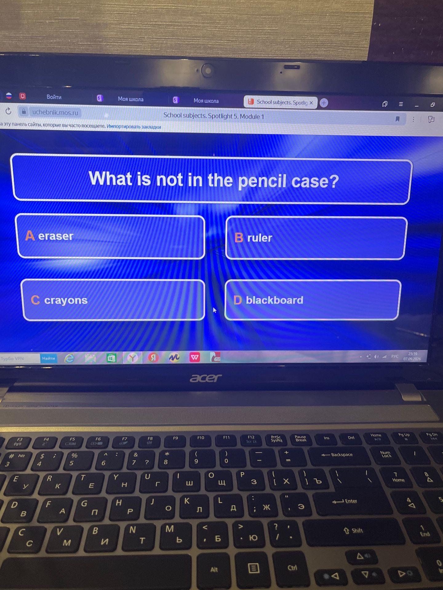 Фото задания: What is not in the pencil case? A) eraser B) ruler C) crayons D) blackboard