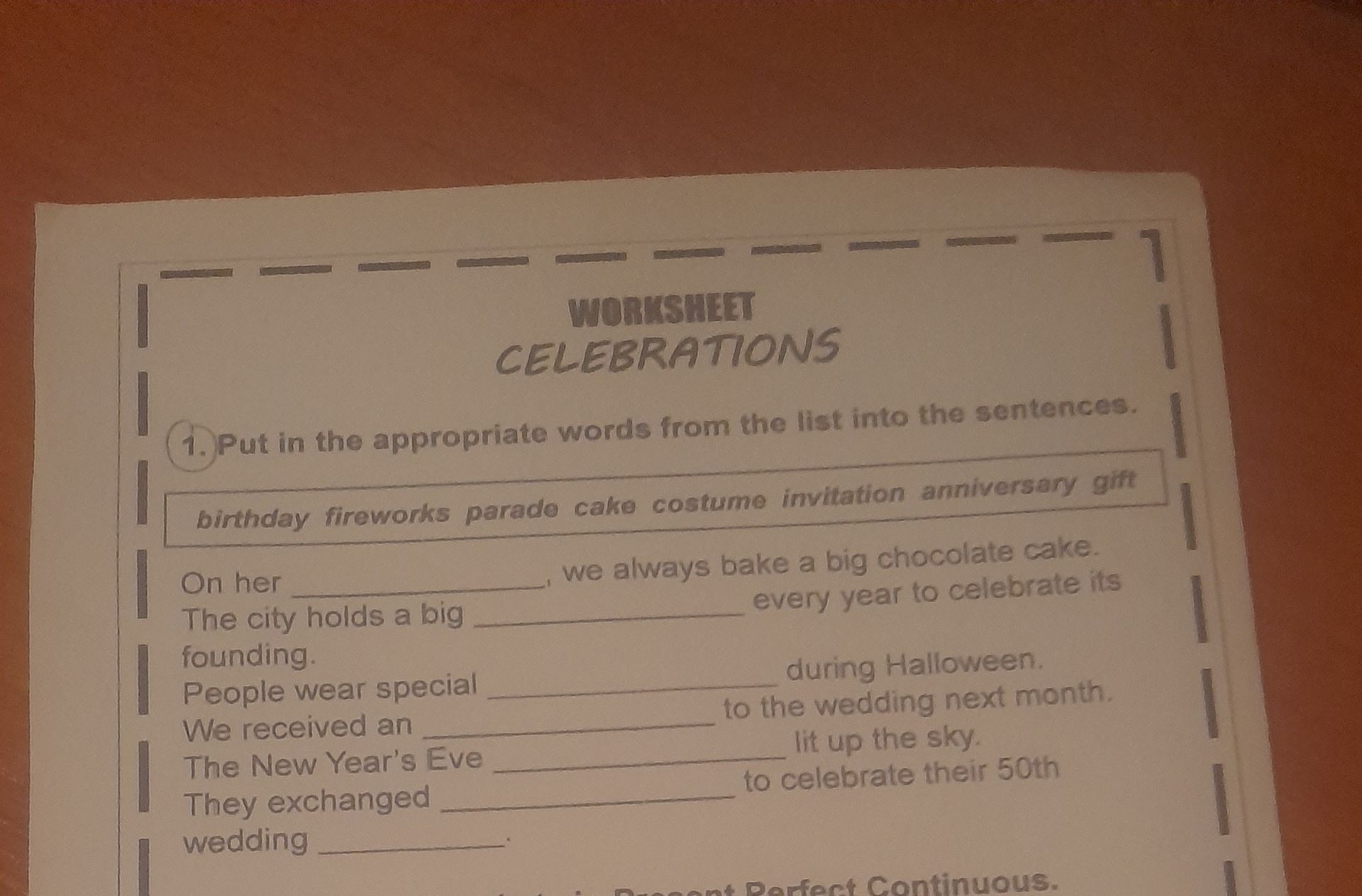 Фото задания: 1. Put in the appropriate words from the list into the sentences. Word list: birthday, fireworks, parade, cake, costume,…