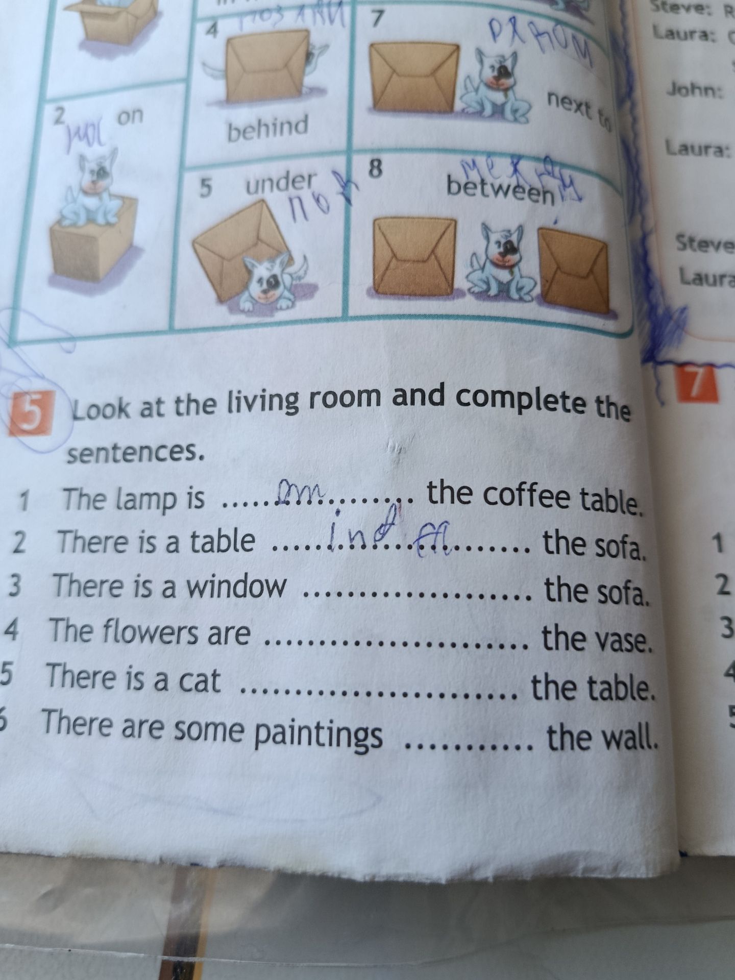 Фото задания: 5. Look at the living room and complete the sentences. 1. The lamp is ................. the coffee table. 2. There is a table…