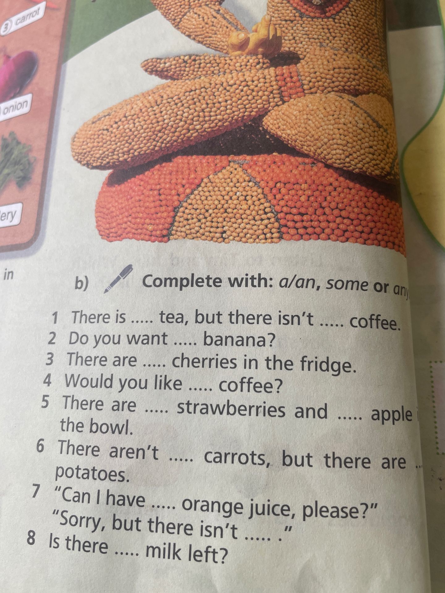 Фото задания: b) Complete with: a/an, some or any. 1. There is ….. tea, but there isn’t ….. coffee. 2. Do you want ….. banana? 3. There are…