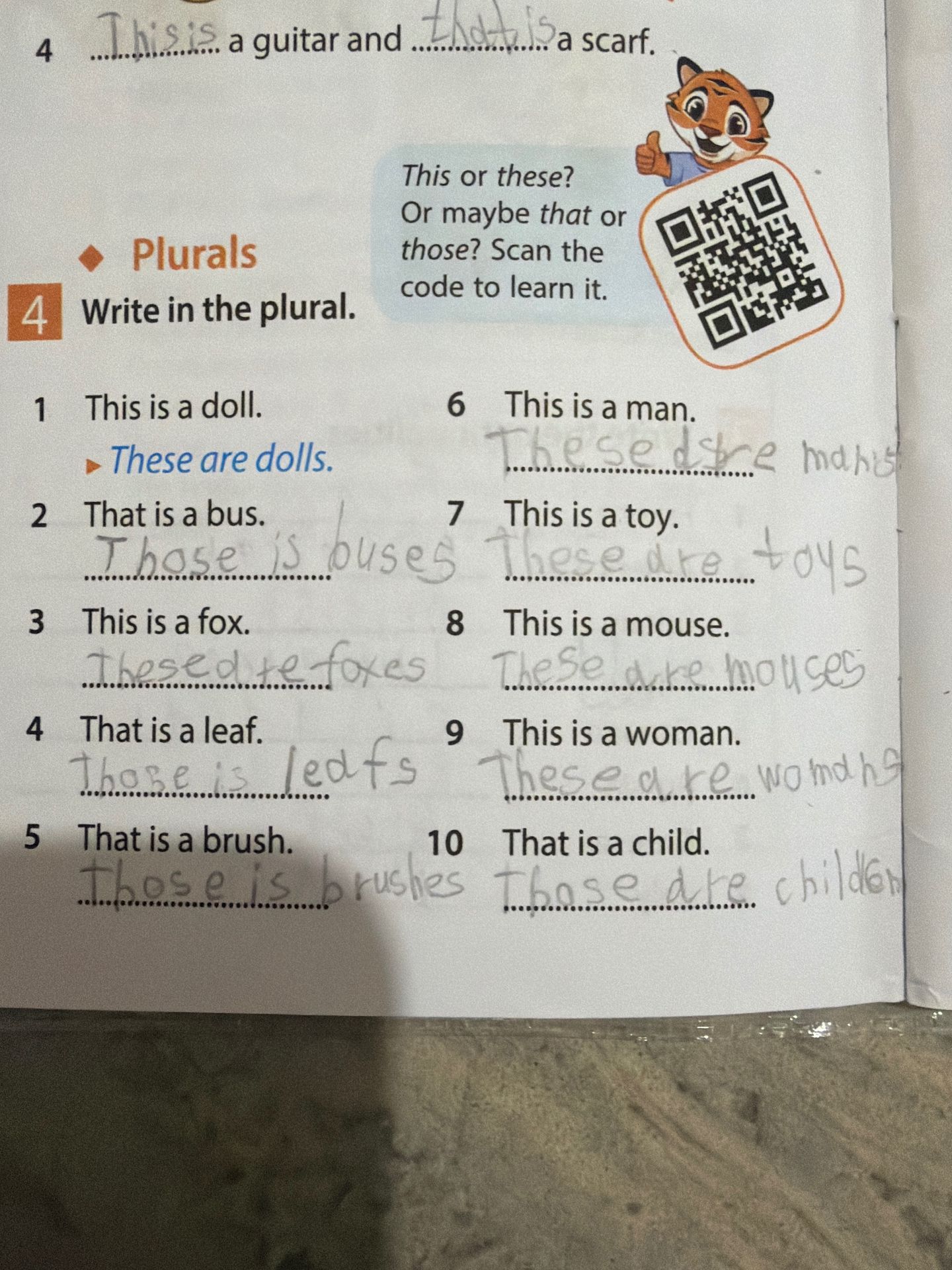 Фото задания: 4. Write in the plural. 1. This is a doll. 2. That is a bus. 3. This is a fox. 4. That is a leaf. 5. That is a brush. 6. This…
