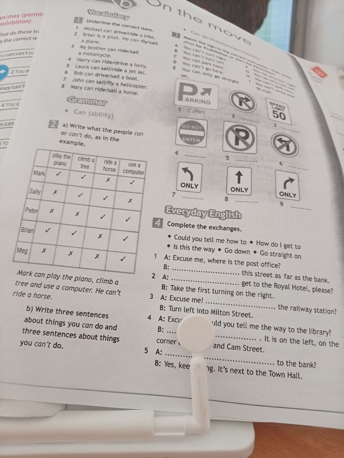 Фото задания: 2. a) Write what the people can or can’t do, as in the example. Table: Mark—can play the piano, climb a tree, use a computer;…