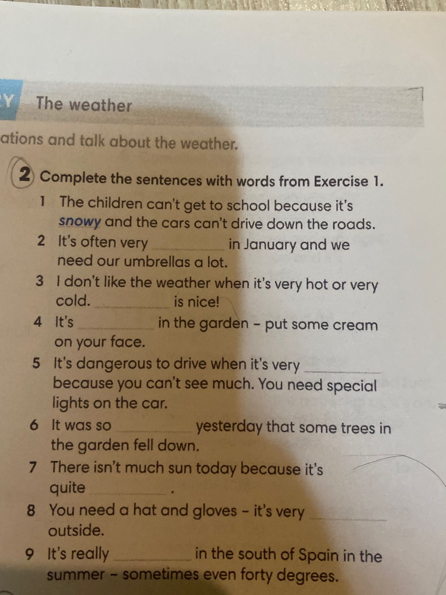 Фото задания: 2. Complete the sentences with words from Exercise 1. 1) The children can't get to school because it's snowy and the cars…
