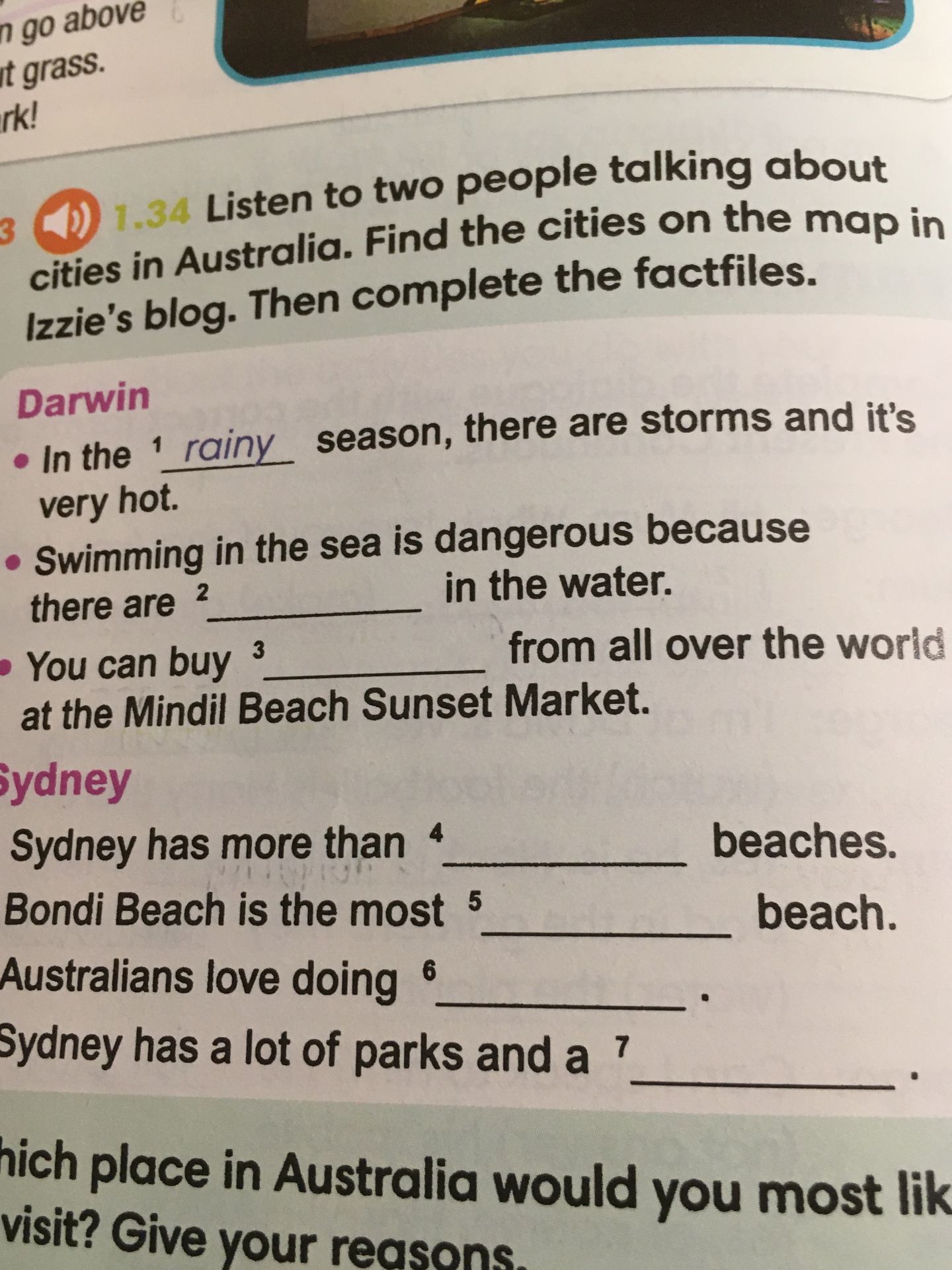 Фото задания: 1.34 Listen to two people talking about cities in Australia. Find the cities on the map in Izzie’s blog. Then complete the…