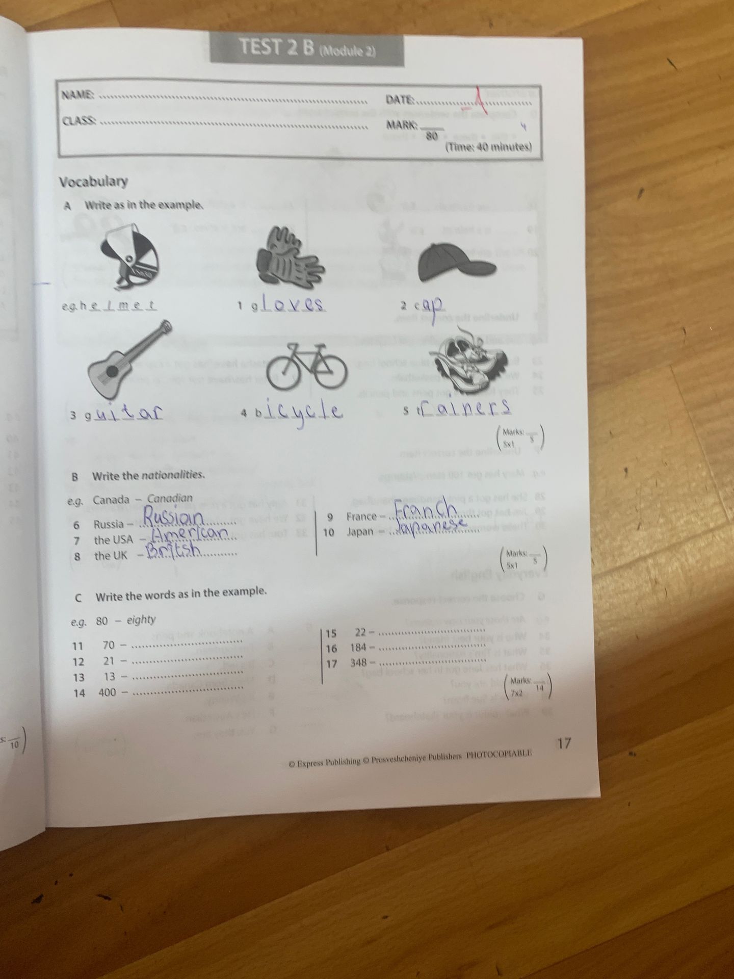 Фото задания: A. Write as in the example. e.g. helmet. 1) gloves 2) cap 3) guitar 4) bicycle 5) trainers