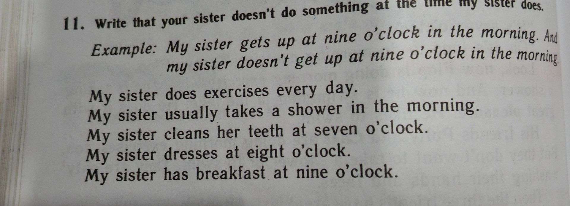 Фото задания: 11. Write that your sister doesn't do something at the time my sister does. Example: My sister gets up at nine o’clock in the…