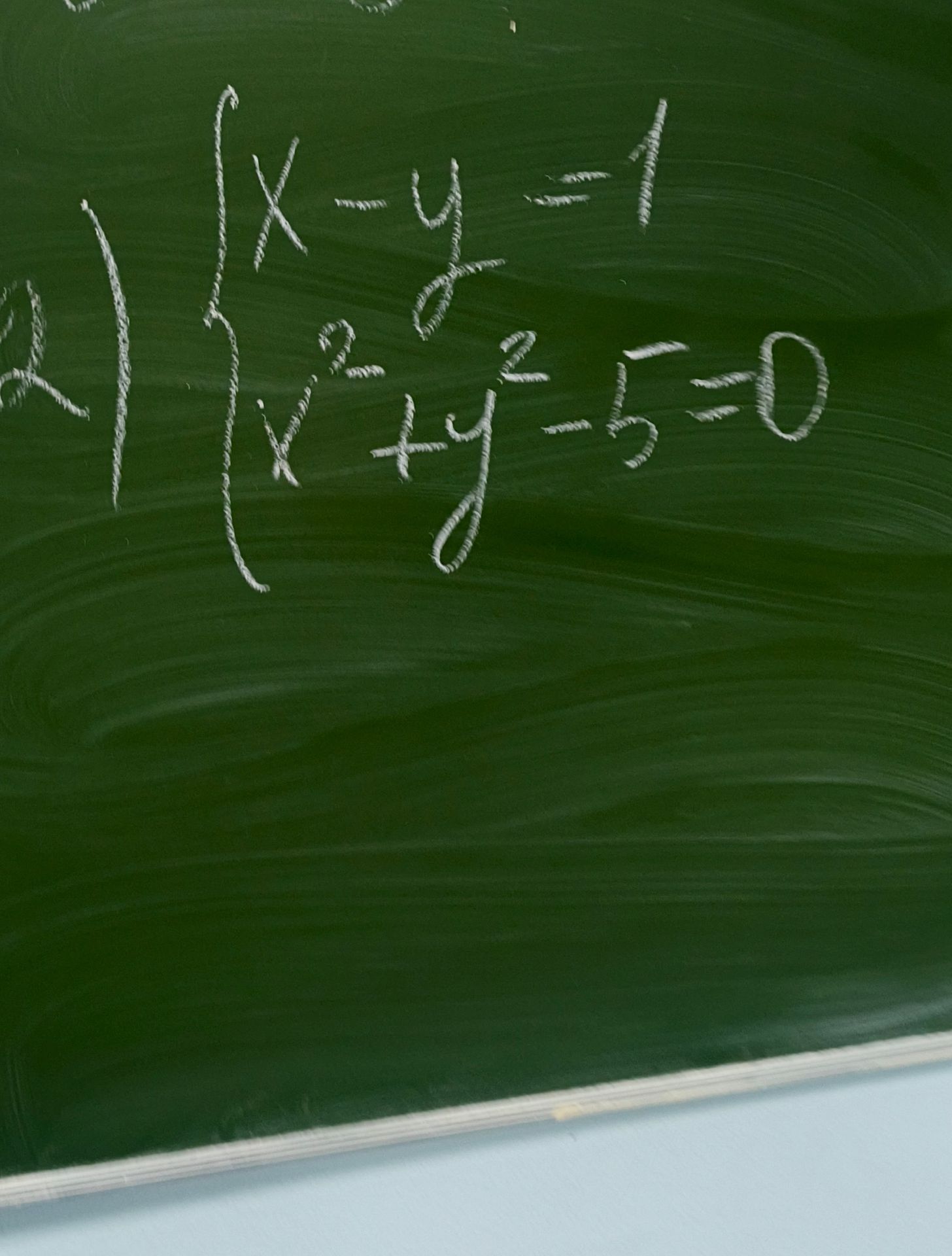 Фото задания: Решите систему уравнений: \(\begin{cases}x-y=1,\\x+y-3=0.\end{cases}\)