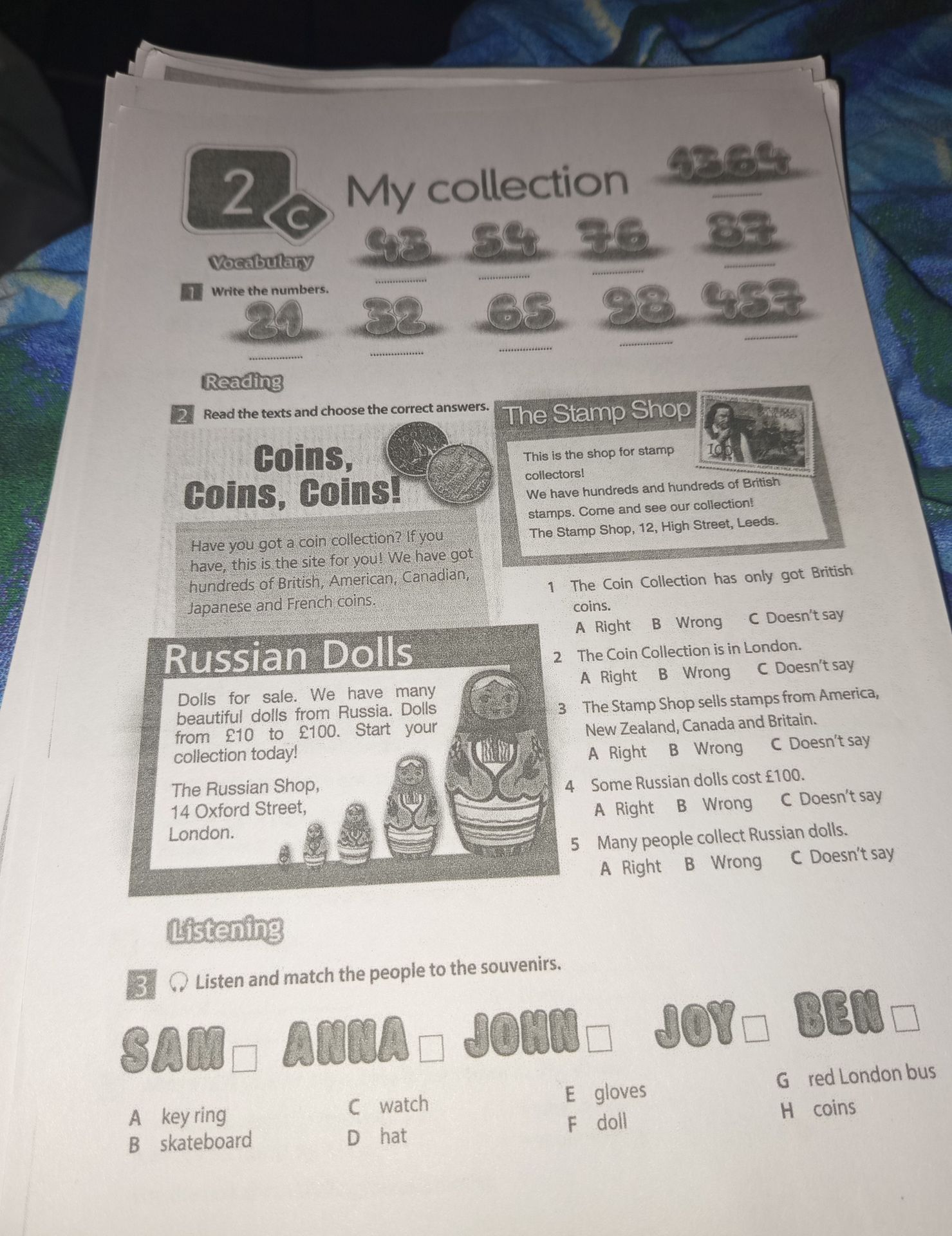 Фото задания: 1. Write the numbers: [top-right number unclear]; 43, 54, 76, 87, 29, 32, 65, 98, [last number in second row unclear].