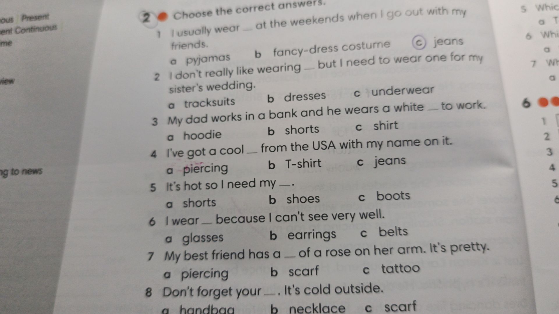 Фото задания: Exercise 2. Choose the correct answers. 1. I usually wear __ at the weekends when I go out with my friends. a) pyjamas b)…